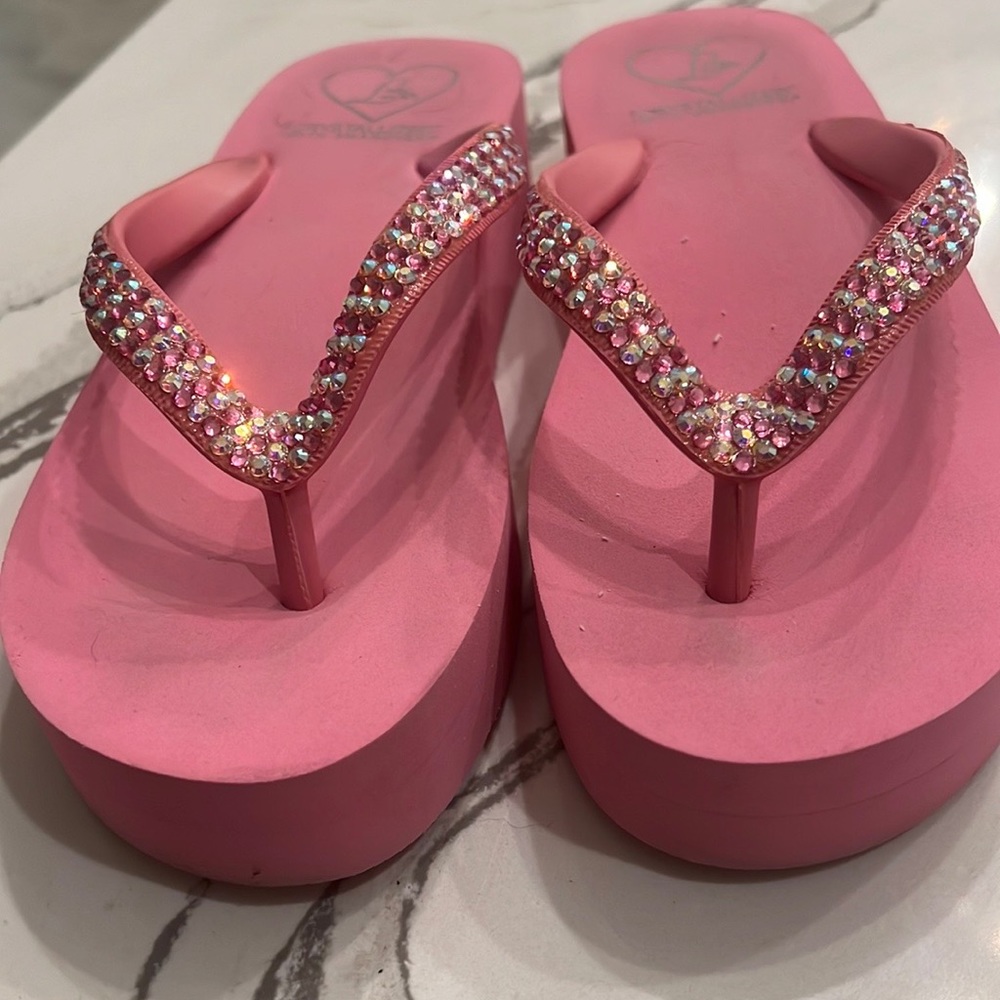 Lady Lanell’s Flip Flops Crystallized with Swarovski. Worn twice.
